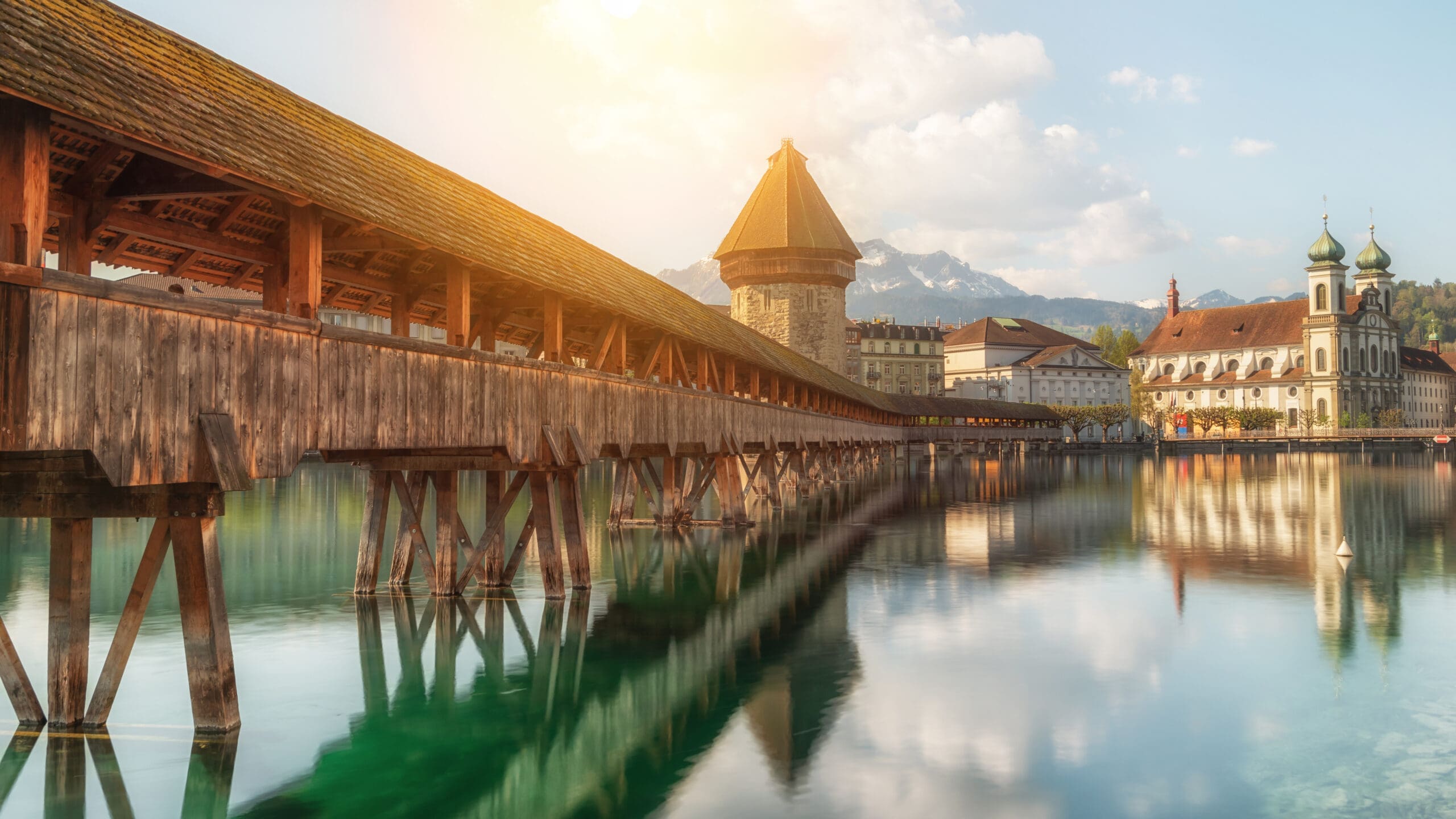The covered wooden Chapel Bridge crossing the Reuss at Lucerne
