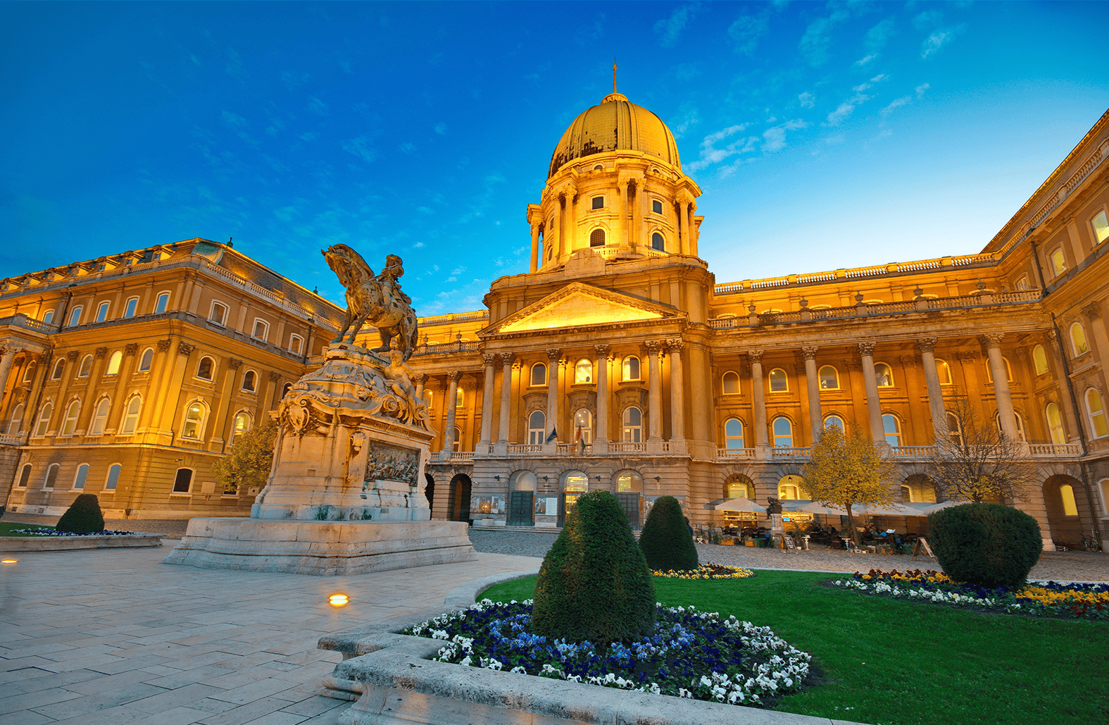 Buda Castle lit above the Danube in Budapest