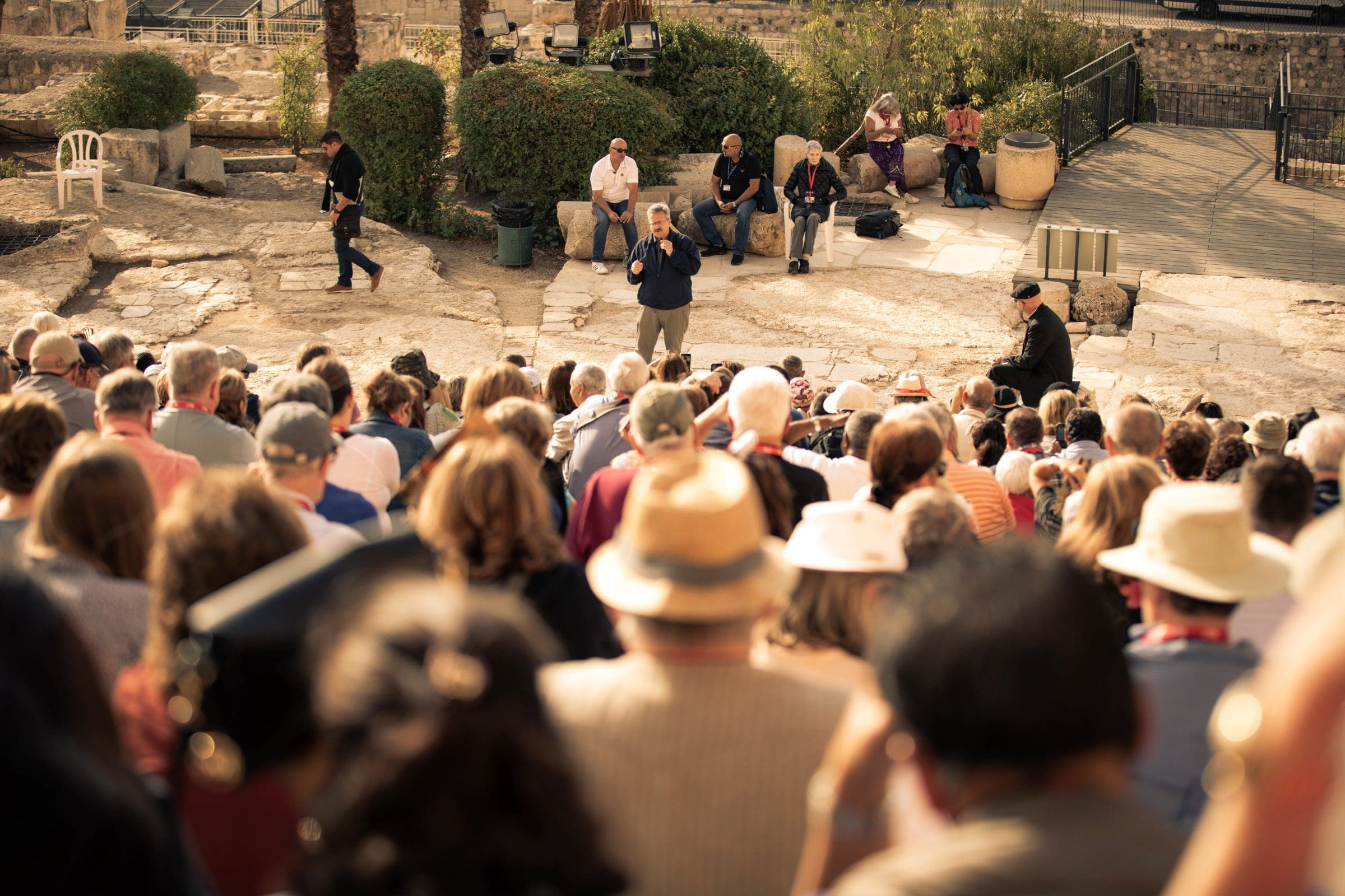 A Canterbury pilgrimage group gathered at a holy site